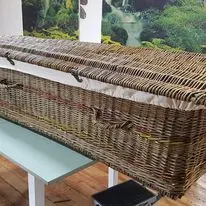 Willow coffin in progress on a workbench