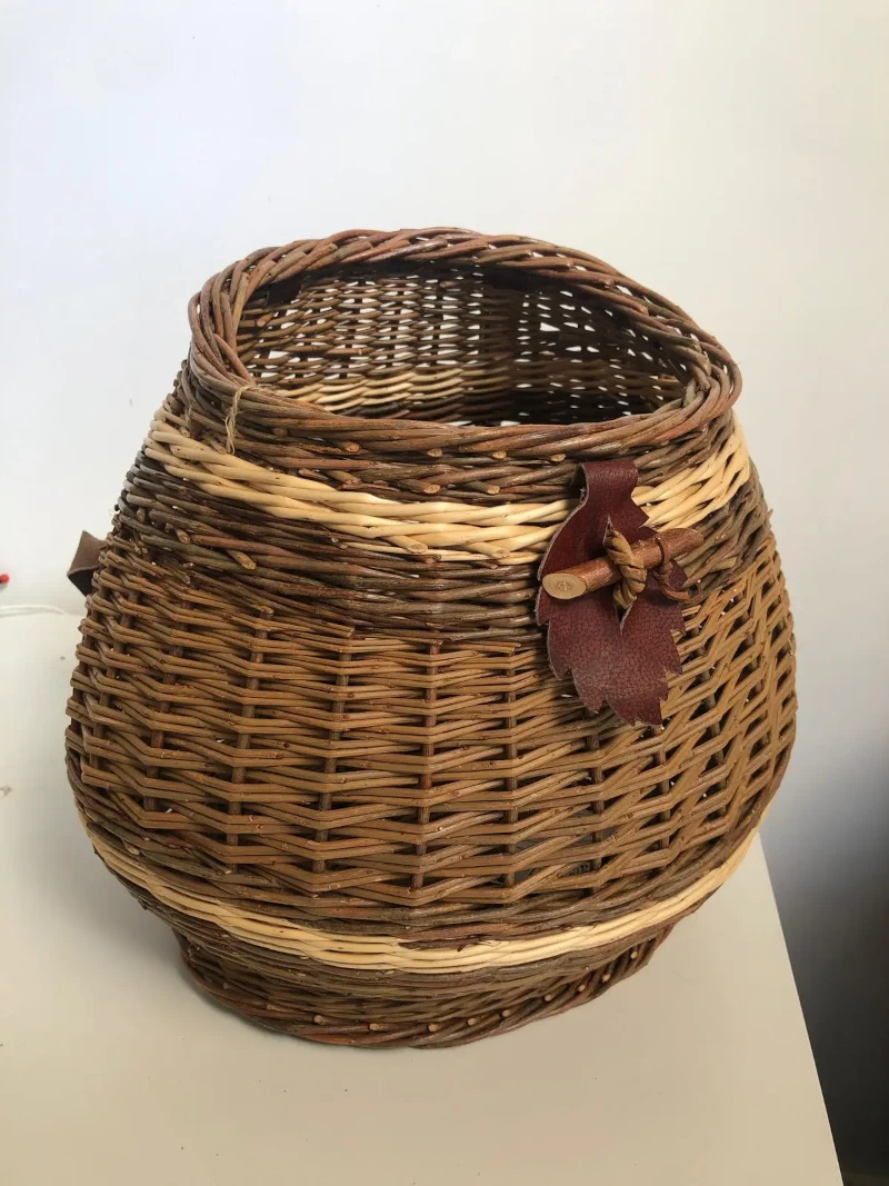 Willow backpack with leather leaf ornament